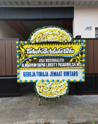 Papan Bunga Duka di Sidorame Barat Ii